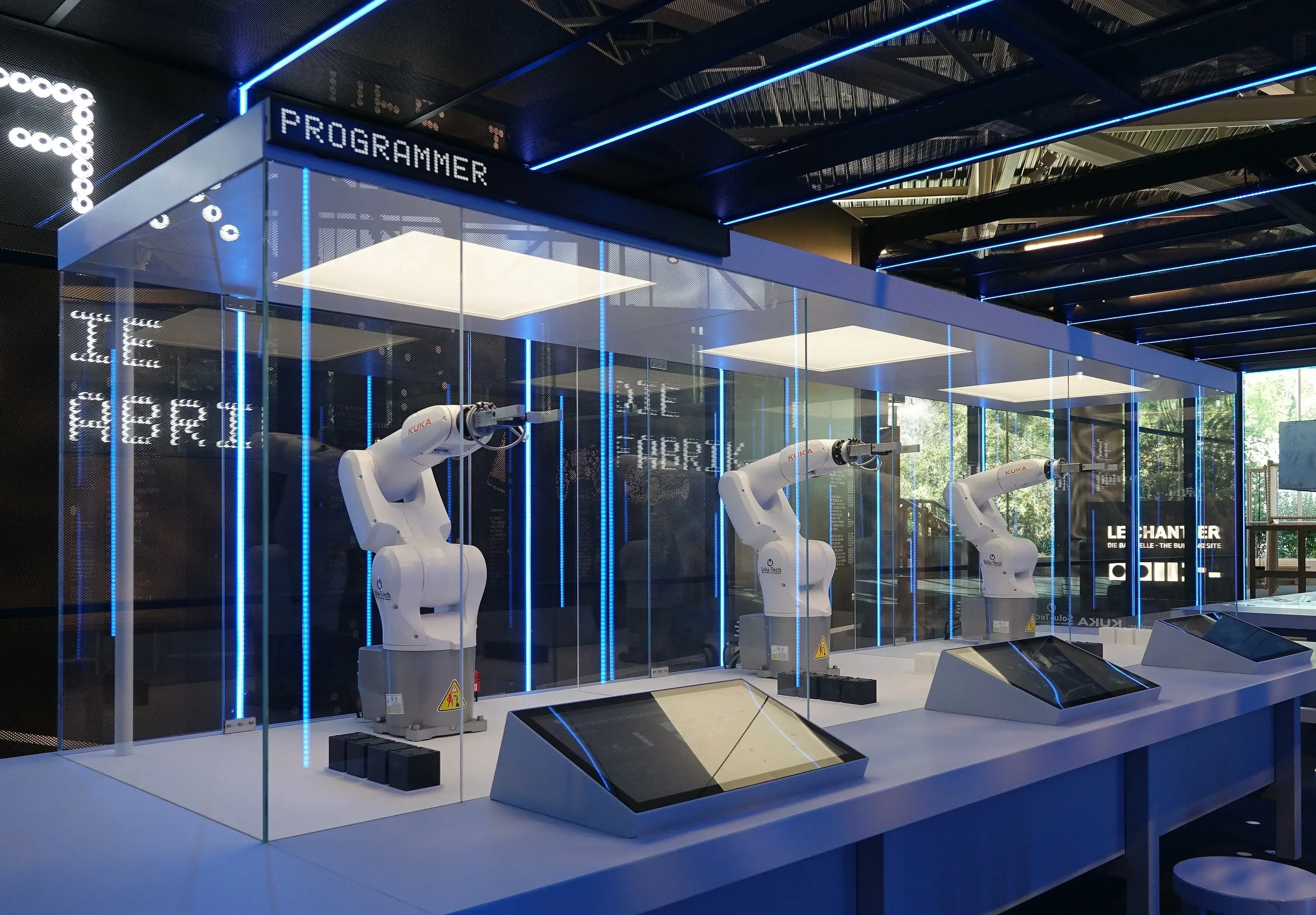 Programmable industrial robot arms at Le Vaisseau in Strasbourg, photographed in July 2025. Related industrial automation photograph.