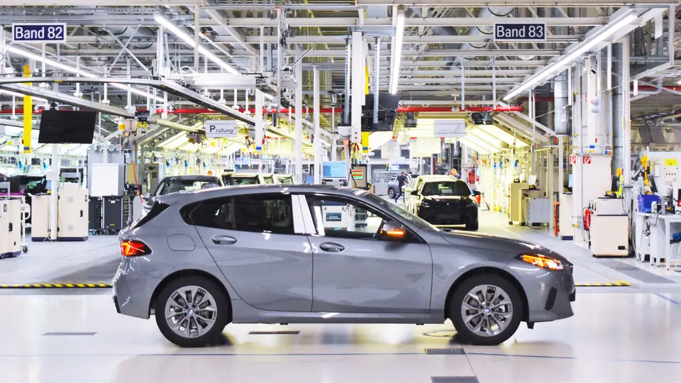 A BMW vehicle moving through a production area equipped for Automated Driving In-Plant.