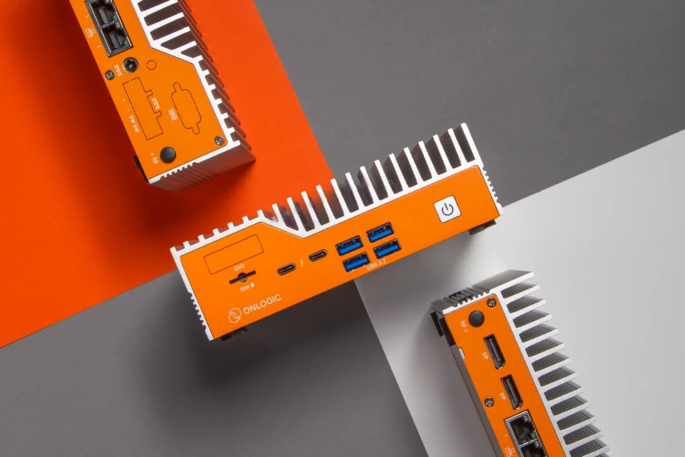 Two orange and gray OnLogic Helix industrial computers shown on a light background.